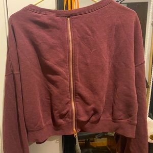 Nike cropped sweatshirt zipper back. Burgundy with gold lettering . Size s/m